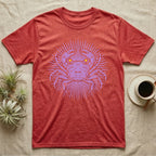 Vampire Crab Folk Medallion T-Shirt in Heather Red — Violet woodblock vampire crab seen face-on, its raised claws cut into a contained folk sunburst medallion.