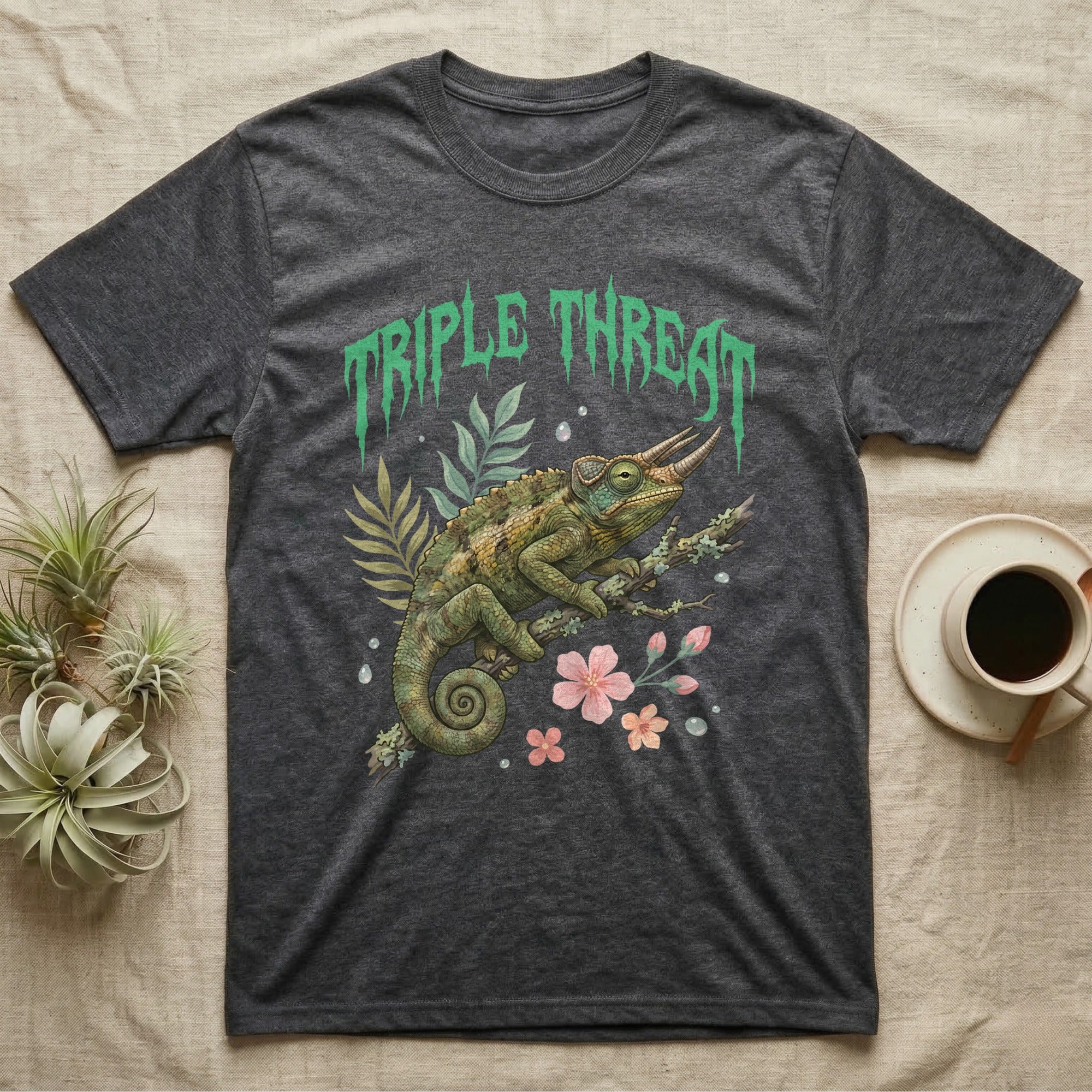 Jackson's Chameleon Feral T-Shirt in Dark Heather — Three-horned Jackson's chameleon on a branch below a dripping jade-green metal "Triple Threat" wordmark