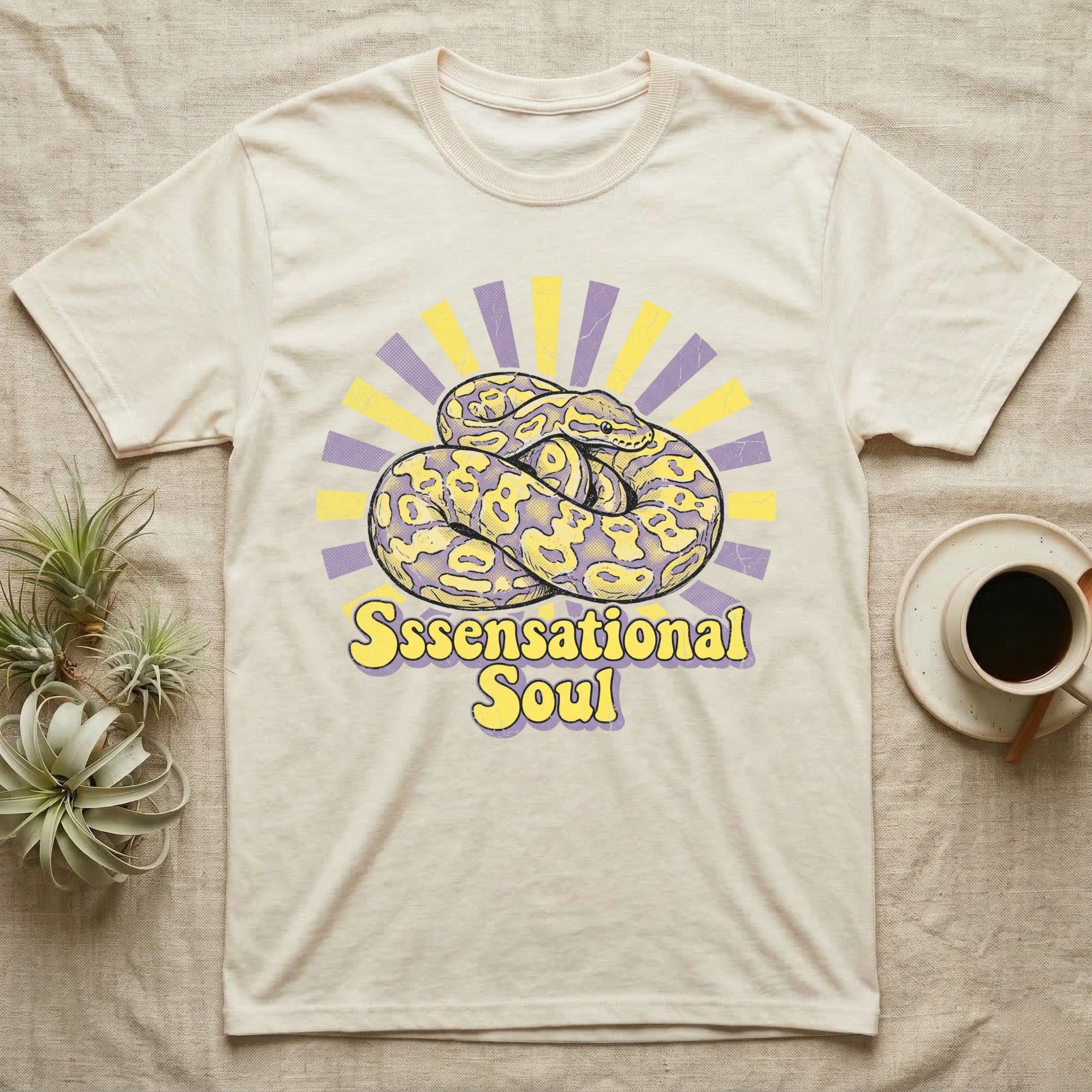 Cream t-shirt with coiled yellow snake and "Sssensational Soul" text.