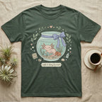 Green t-shirt with axolotl in a jar graphic and text "soft & slimy & sweet".