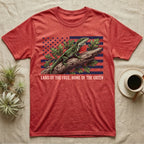 Green Anole 1776 T-Shirt in Heather Red — Realistic green anole with a red dewlap on a branch over a distressed flag under text Land of the Free, Home of the Green.