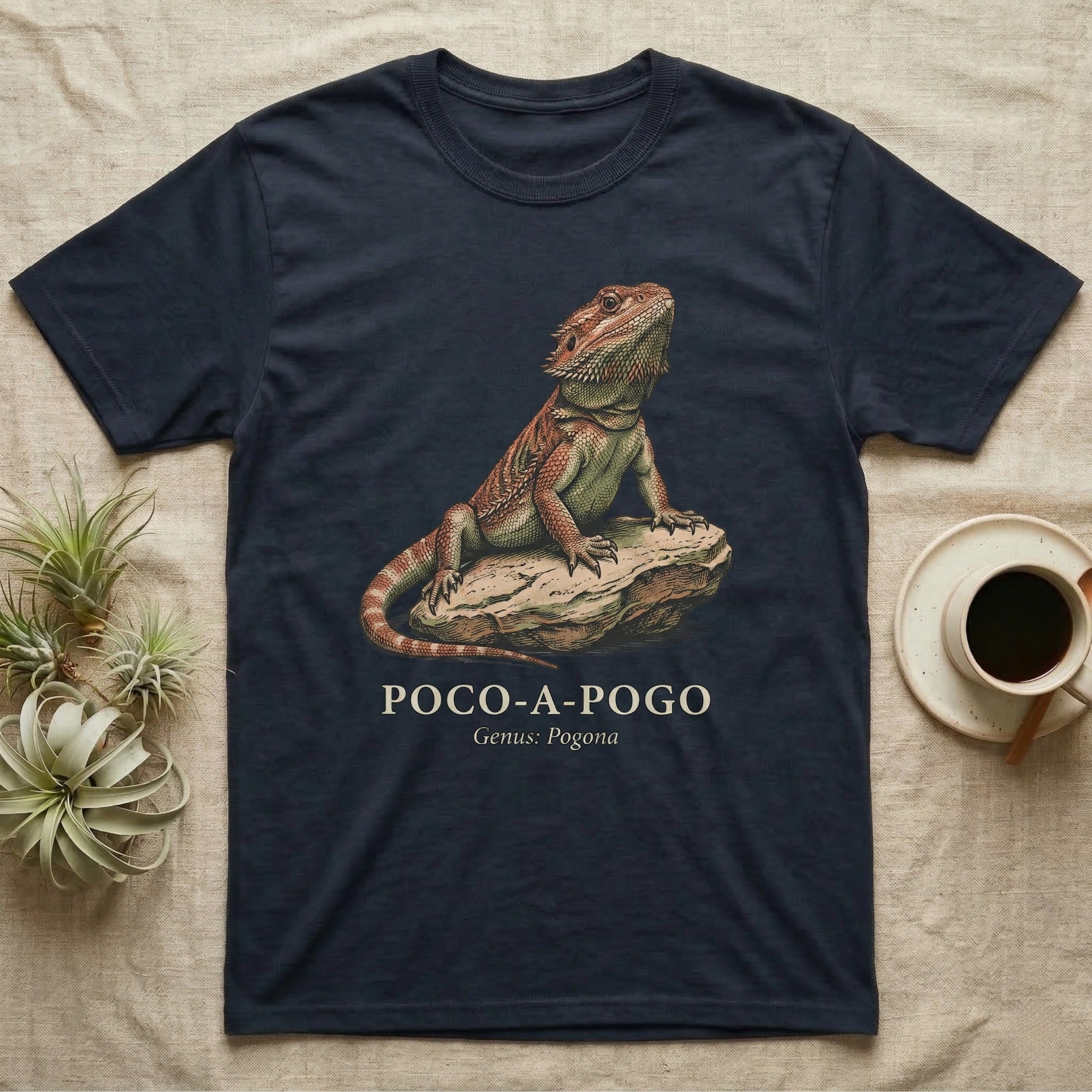 Navy t-shirt with illustration of a bearded dragon on a rock.