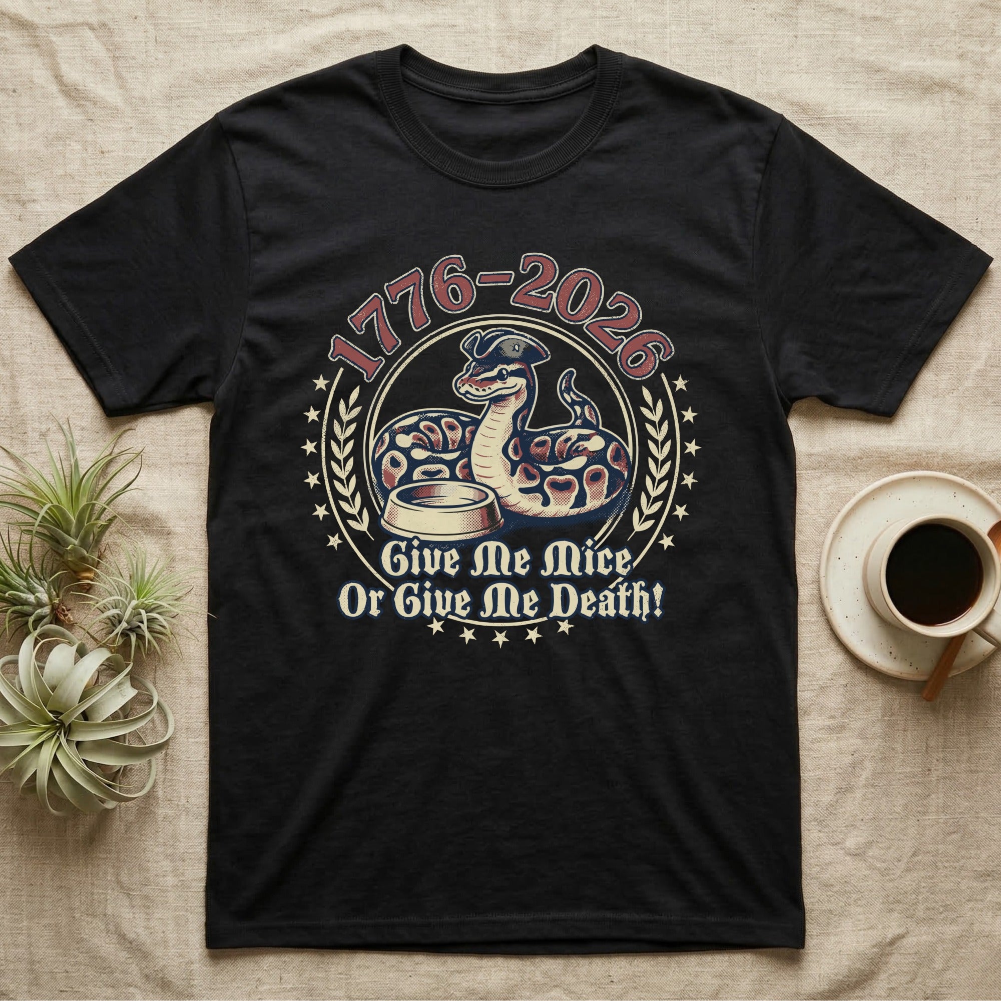 Ball Python 1776 T-Shirt in Black — Vintage distressed badge of a ball python in a feeding strike over a food dish, cream and brick-red emblem reading Give Me Mice Or Give Me Death.