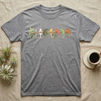 Crested Gecko Canopy Crew T-Shirt in Sport Grey — Watercolor illustration of seven crested gecko colour morphs perched on a branch, dark grey T-shirt design.