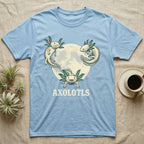 Three Axolotl Moon Tee in Light Blue — Retro-illustration of three smiling axolotls with feathery gill plumes arranged around a stratified halftone full moon.