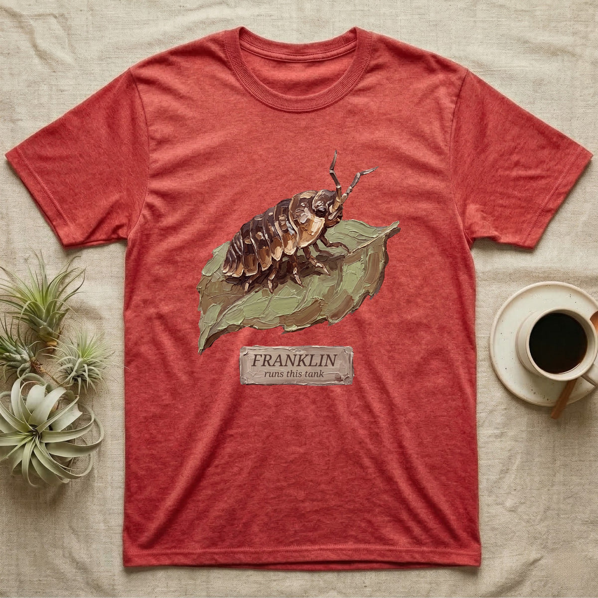Franklin Isopod Tank T-Shirt in Heather Red — Impasto oil-painting portrait of an isopod on a leaf with an engraved Franklin name-plate beneath the subject.