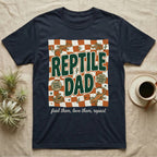 Navy t-shirt with "Reptile Dad" graphic, featuring lizards and text.