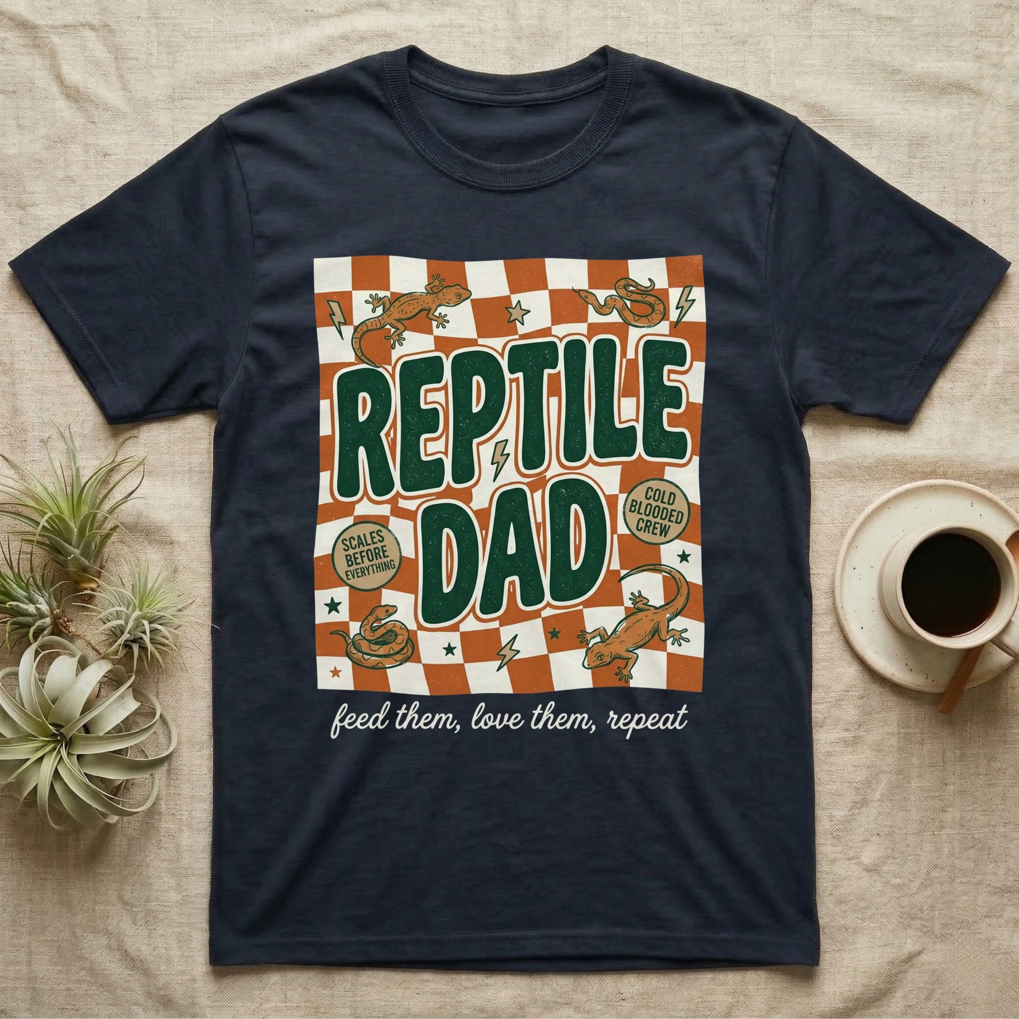 Navy t-shirt with "Reptile Dad" graphic, featuring lizards and text.