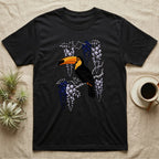 Black t-shirt with toucan and wisteria floral design.
