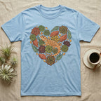 Light blue t-shirt with heart-shaped succulent and lizard graphic.