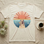 Hermit Crab Big Stretch T-Shirt in Natural — Palette-knife painted medallion of a Caribbean hermit crab at full stretch under a coral sunburst.
