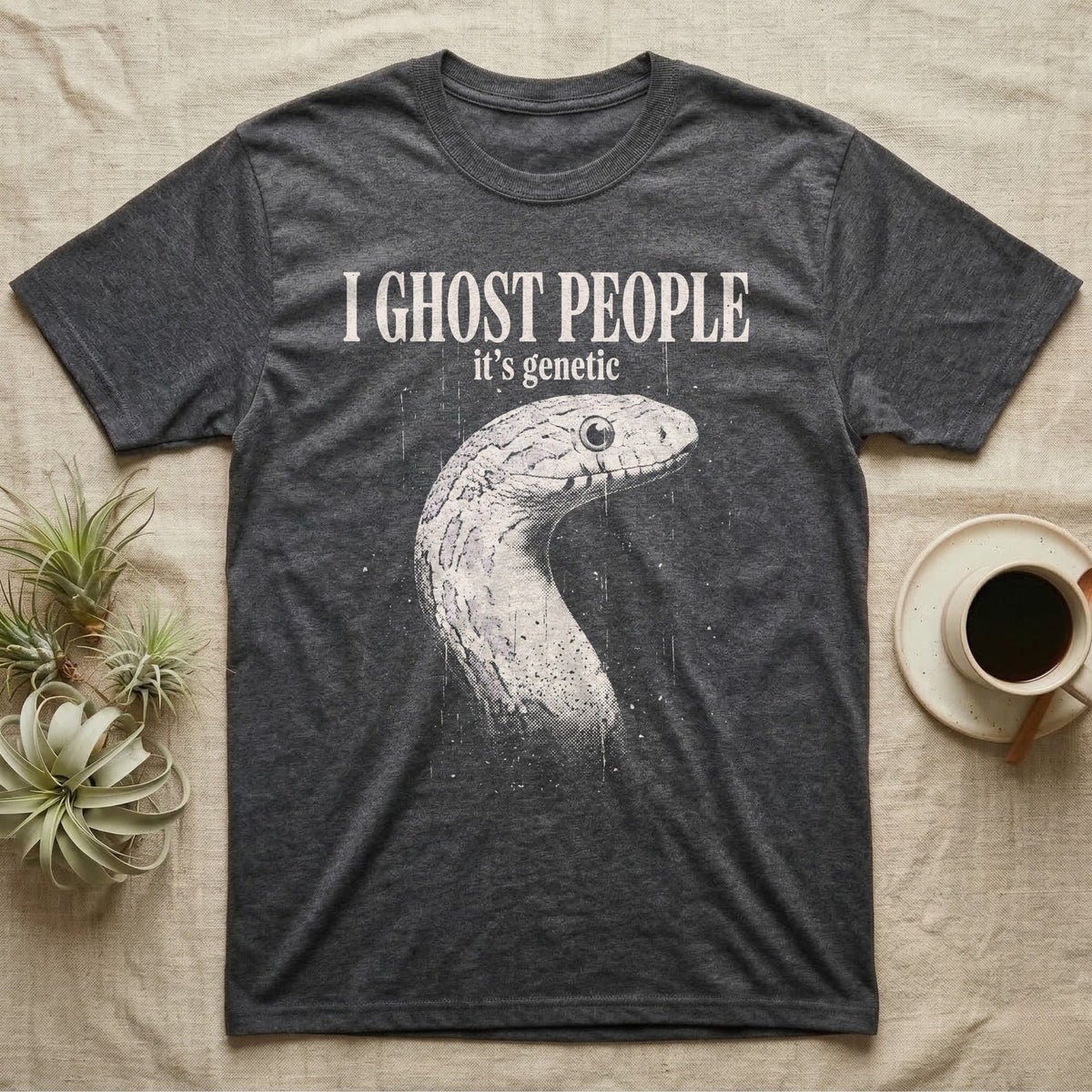 Ghost Corn Snake T-Shirt in Dark Heather — Gritty one-ink white print of a pale ghost corn snake head under the words I GHOST PEOPLE, it's genetic, on black