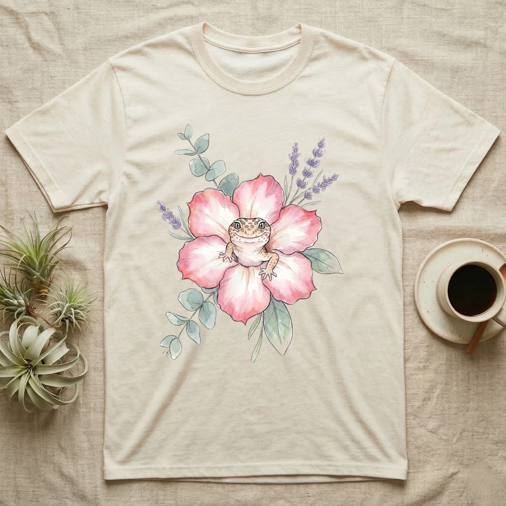 Cream t-shirt with watercolor gecko on pink flower and lavender sprigs.
