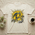 Yellow and blue macaw perched on a branch, sunburst background on a cream t-shirt.
