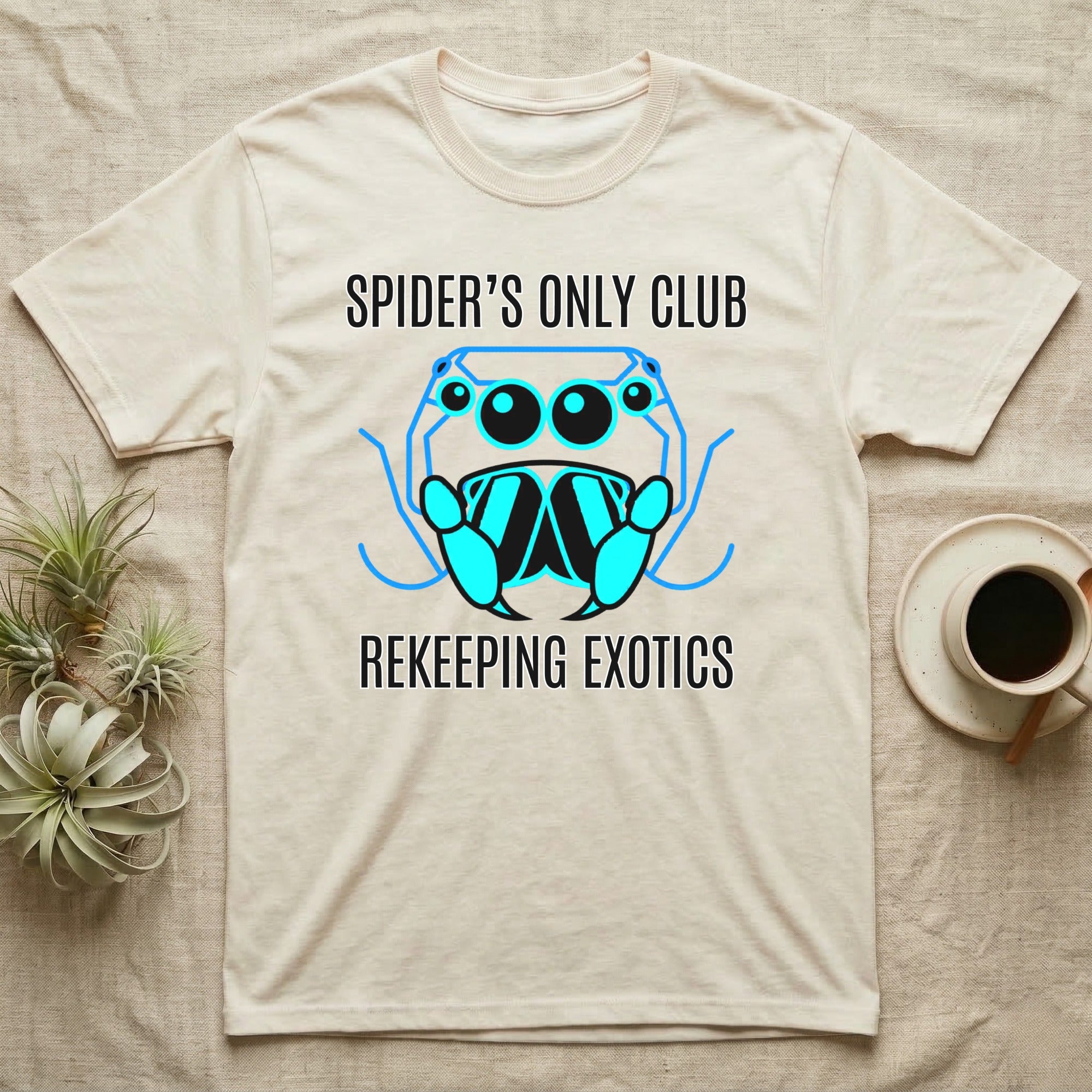 Spider's Only Club Rekeepeing Exotics graphic on a cream t-shirt.