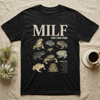 Budgett's Frog MILF T-Shirt in Black — Seven Budgett's frogs in a cut-out photo collage under the huge cream word MILF, man I love budgett's frogs.