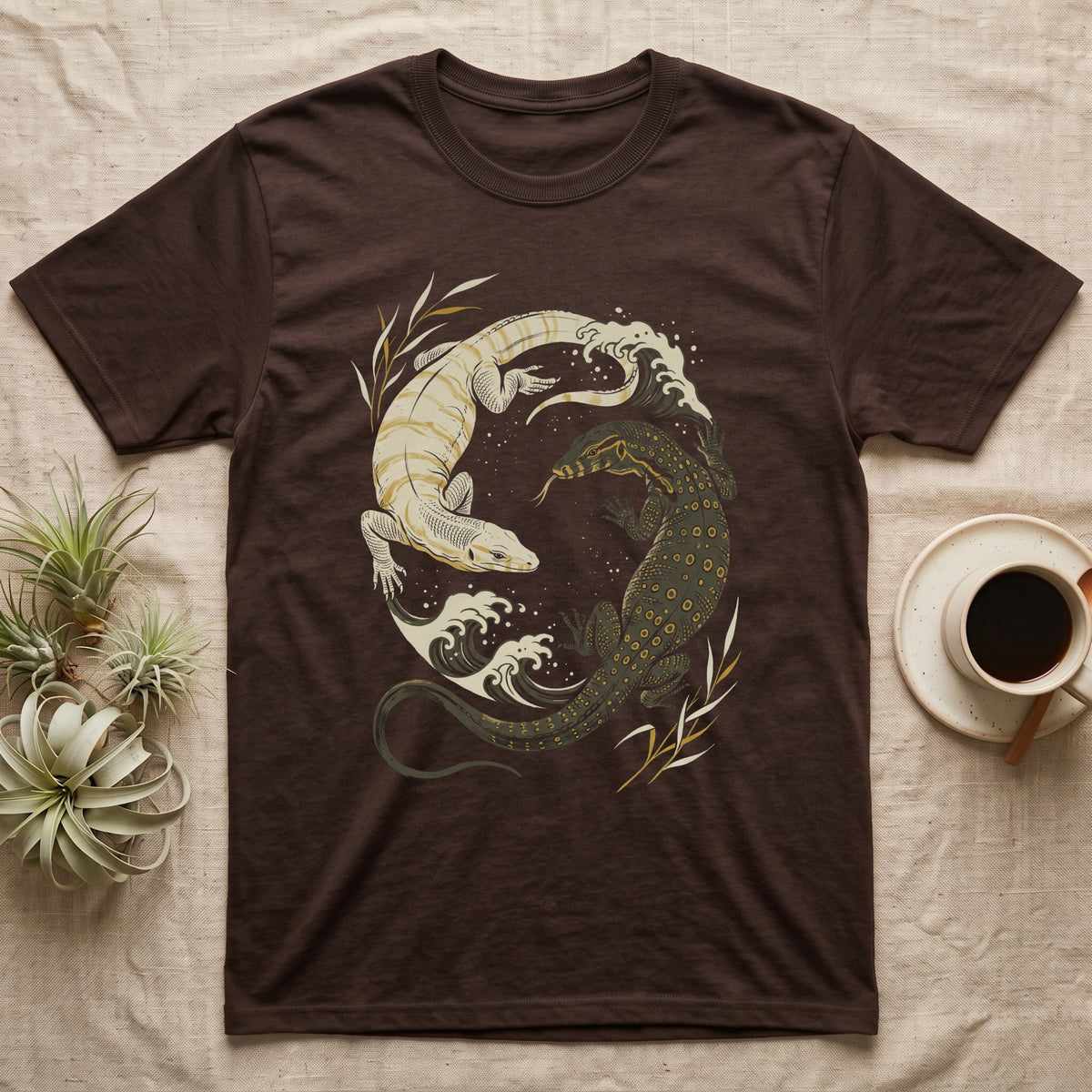 Water Monitor Yin-Yang T-Shirt in Dark Chocolate — Woodblock print of two Asian water monitors, one charcoal and one albino, curled nose to nose into a circle with river waves