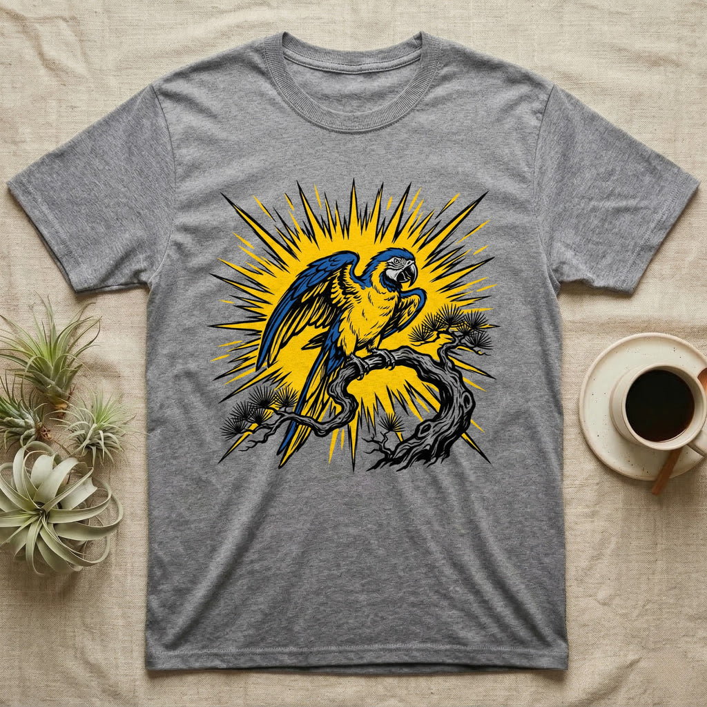 Grey t-shirt featuring a blue and yellow parrot perched on a branch with a sunburst design.