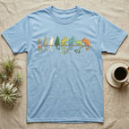 Veiled Chameleon Canopy Crew T-Shirt in Light Blue — Watercolor illustration of seven veiled chameleons in different colour phases on a ficus branch, dark grey T-shirt design.