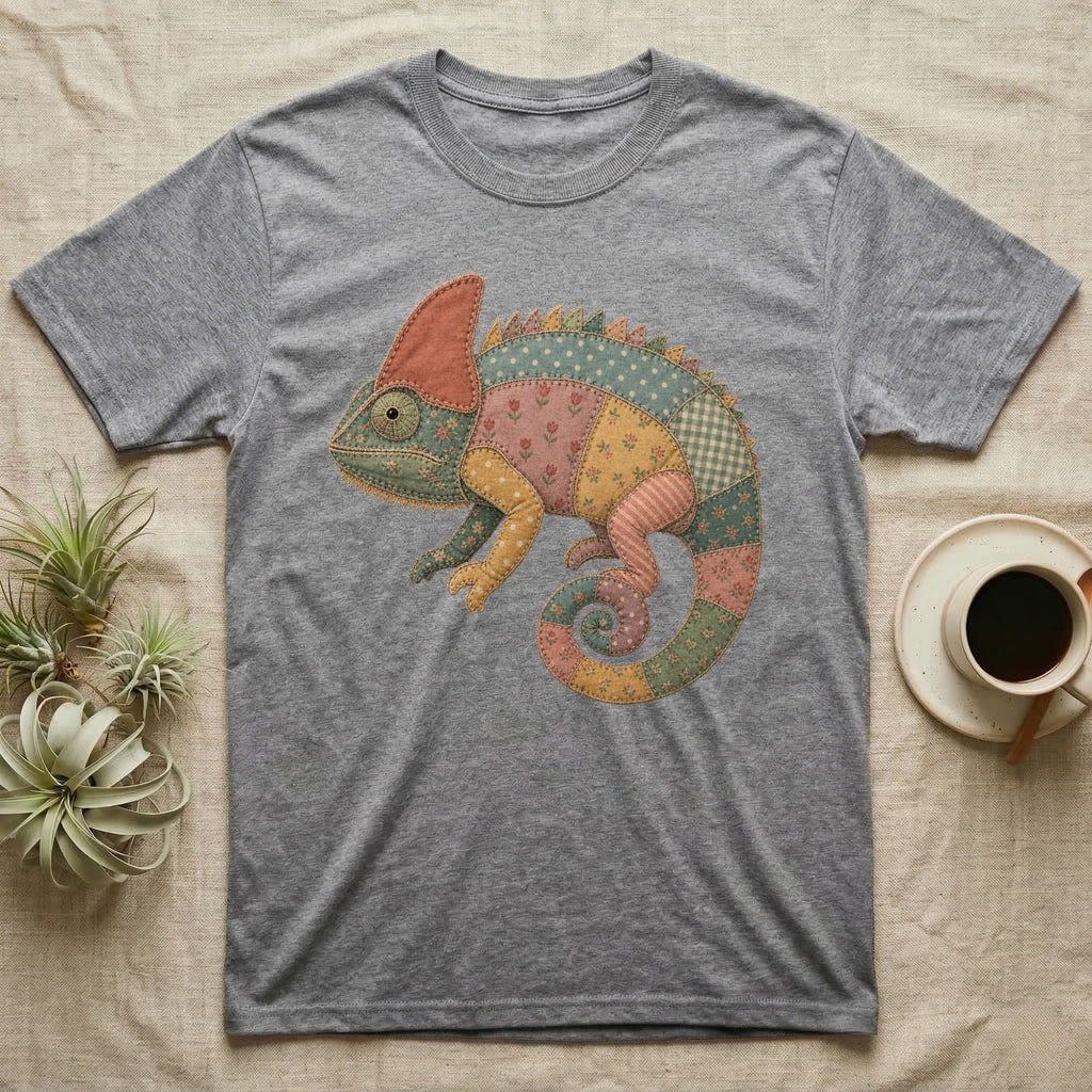 Grey t-shirt with a patchwork chameleon graphic.