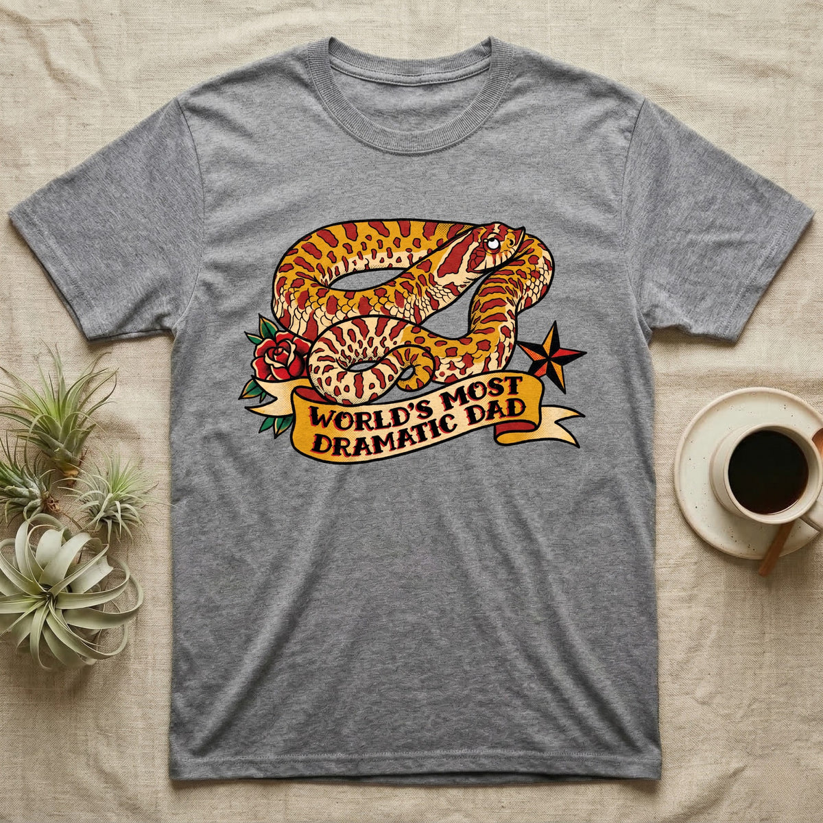 Dramatic Dad Hognose T-Shirt in Sport Grey — Tattoo-flash illustration of a hognose snake mid-dramatic-flop with a banner reading World's Most Dramatic Dad.