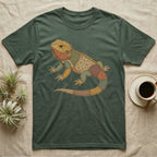 Green t-shirt with a patchwork lizard graphic.