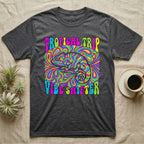 Dark grey t-shirt with a vibrant, psychedelic chameleon and "Tropical Trip Vibe Shifter" text.