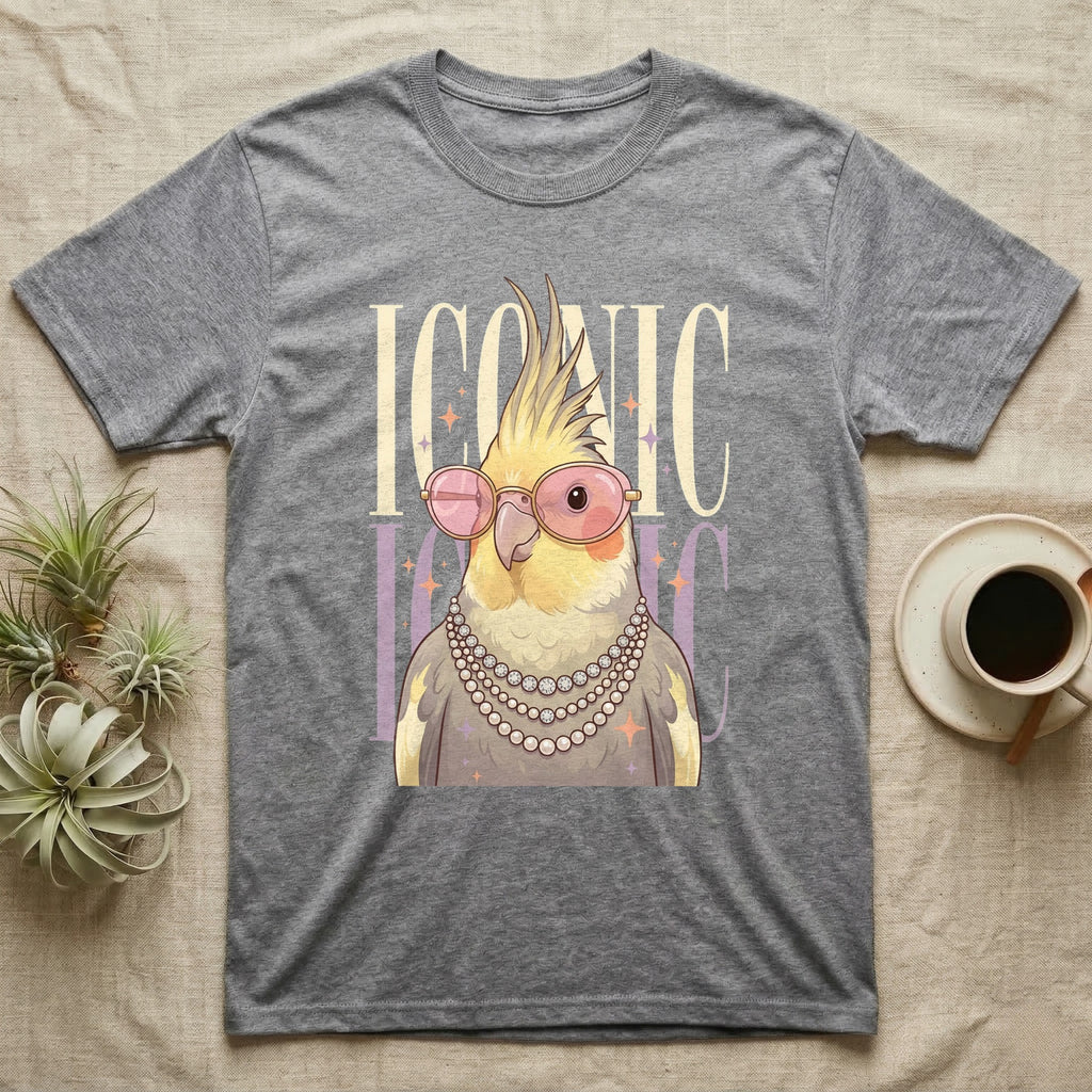 Grey t-shirt with a illustrated cockatiel wearing pearls and sunglasses, text "ICONIC".