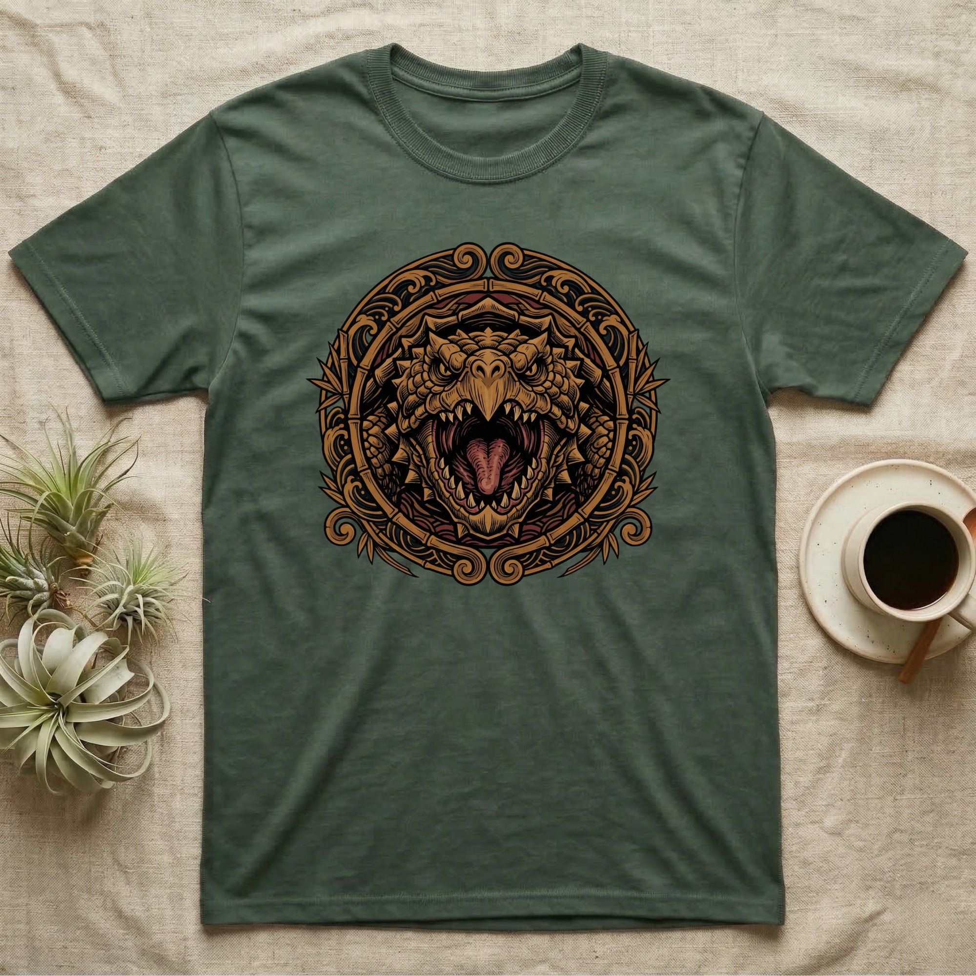 Green t-shirt with a circular, ornate dragon head design.
