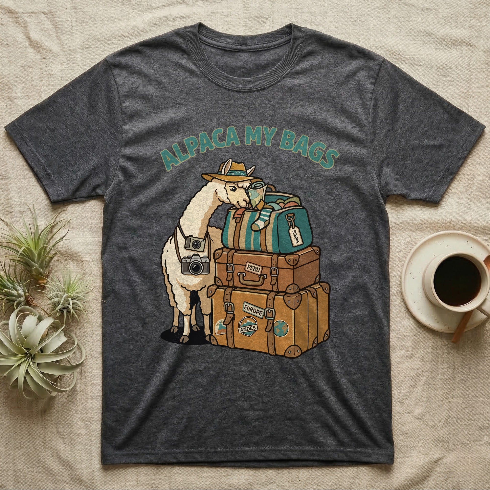 T-shirt with alpaca wearing hat and carrying luggage, "Alpaca My Bags" text.