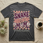 Dark grey t-shirt with "Snake Mom" text and coiled snakes, with checkered background.