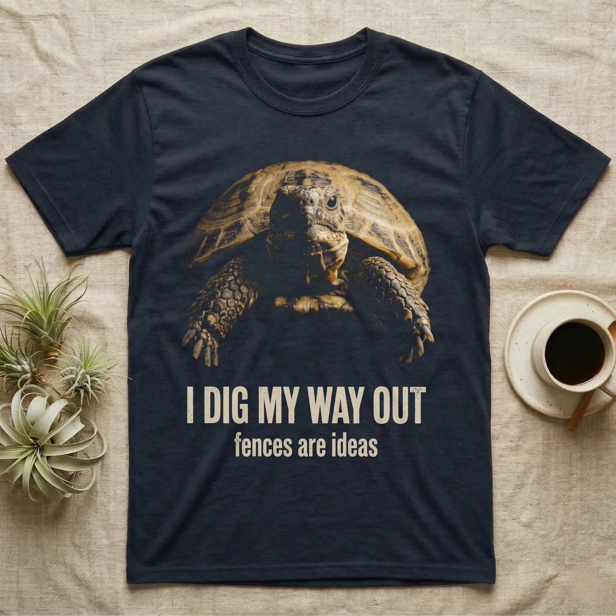 Deadpan mugshot of a Russian tortoise on black, captioned I dig my way out, fences are ideas. — shown on a Navy tee.