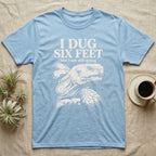 Sulcata Tortoise Dug Six Feet T-Shirt in Light Blue — One-ink white sulcata tortoise portrait on black under the words I DUG SIX FEET and I am still going.