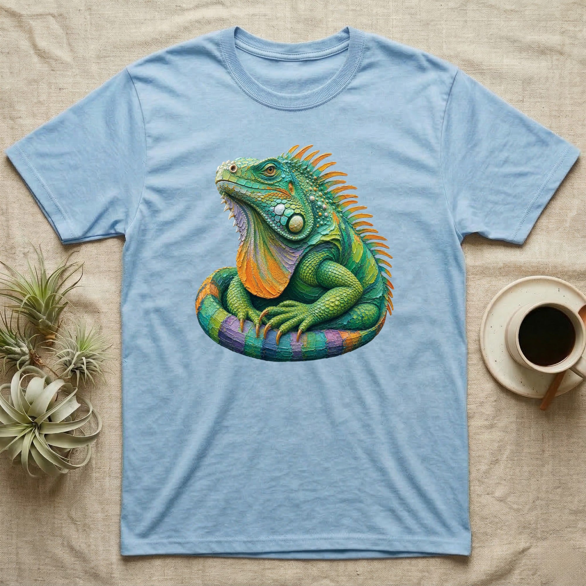 Light blue t-shirt with a colorful iguana graphic.