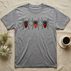 Velvet Spider Triptych T-Shirt in Sport Grey — Three velvet spiders in a row, painted in thick impasto, each with a differently coloured red-and-black abdomen.