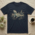 Bearded Dragon Dinosaur T-Shirt in Navy — Faded 90s nature-doc illustration of a bearded dragon posed in profile as a tiny dinosaur specimen on a field plate.