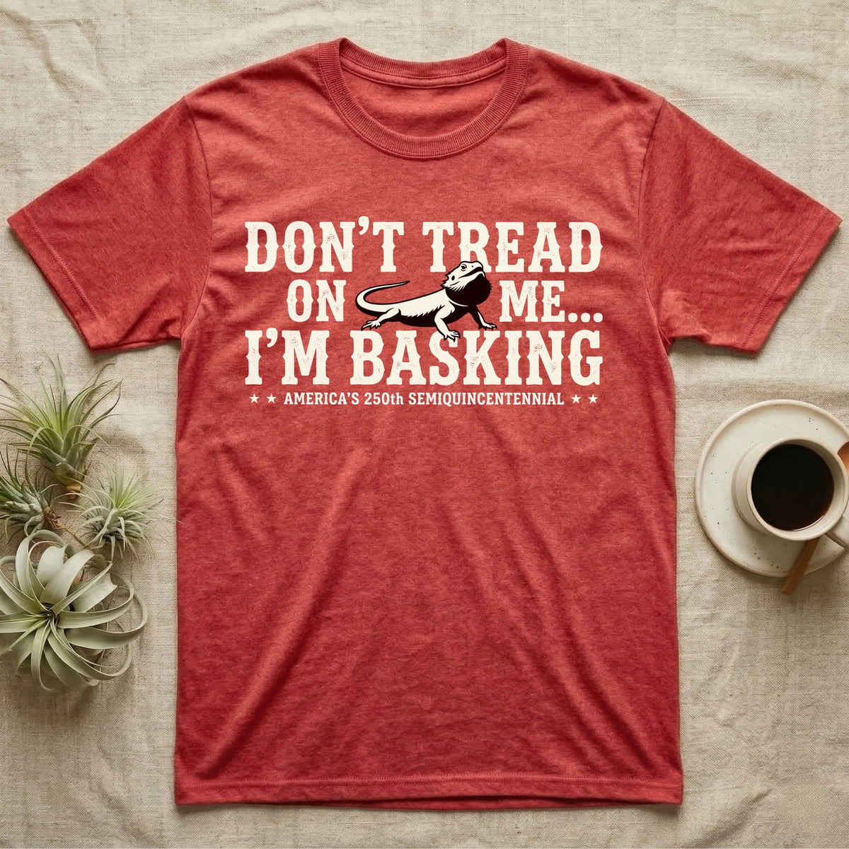 Bearded Dragon Basking Silhouette T-Shirt in Heather Red — Cream bearded dragon silhouette nested into distressed block text reading Don't Tread On Me, I'm Basking.