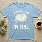 Guinea Pig Popcorning 3AM Tee in Light Blue — Grunge-distressed guinea pig mid-popcorn with all four feet airborne and distressed type "Popcorning At 3AM I'm Fine."