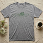 Minimal Swimming Frog T-Shirt in Sport Grey — Minimal single-line illustration of a frog at the waterline with concentric ripple rings and vast negative space.
