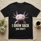 Photographic mugshot of an axolotl with gill stalks fanned wide above the hook I Grow Back, you don't. — shown on a Black tee.