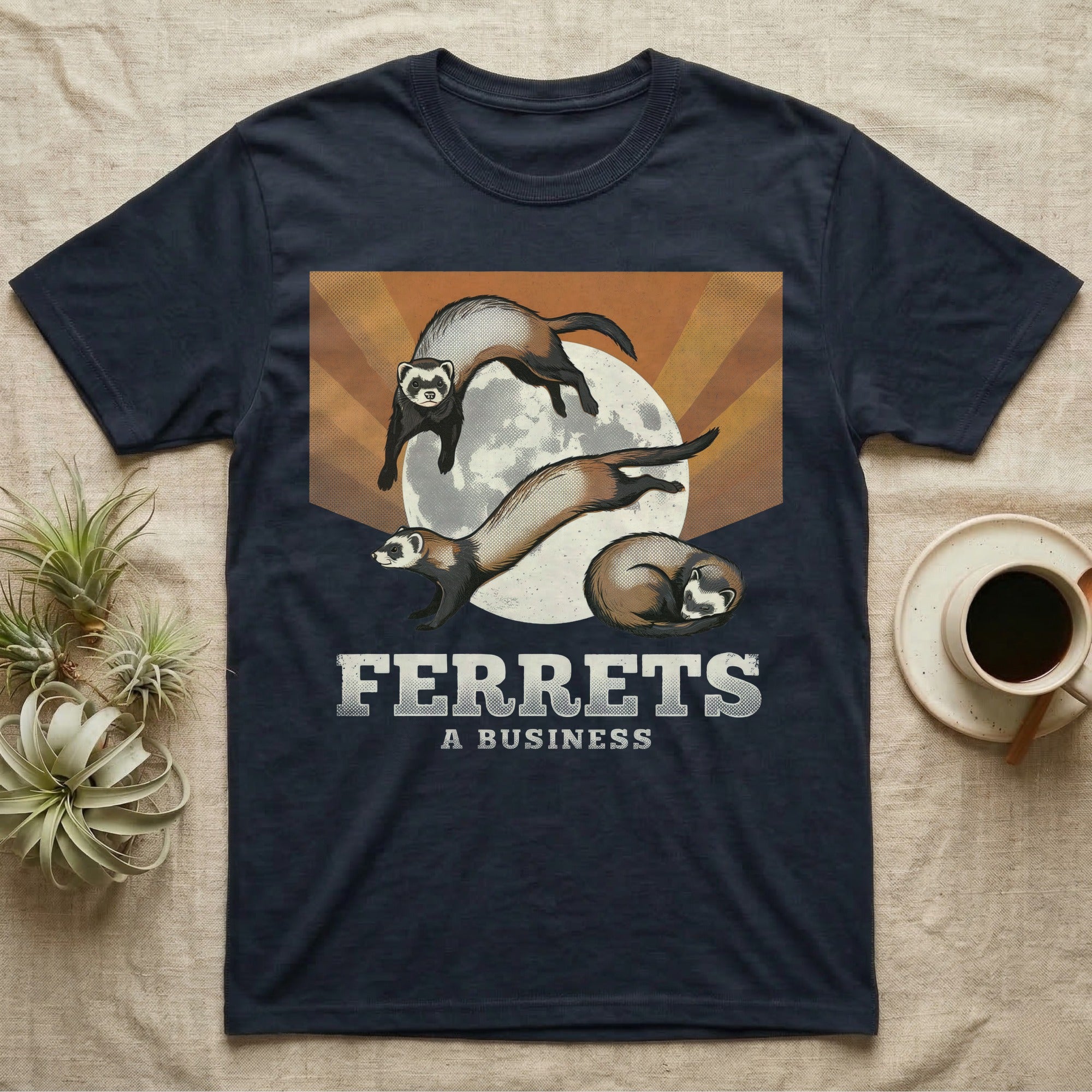 Three Ferret Moon Tee in Navy — Retro-illustration of three ferrets in war-dance, stretch, and sleeping-coil poses around a stratified halftone full moon.