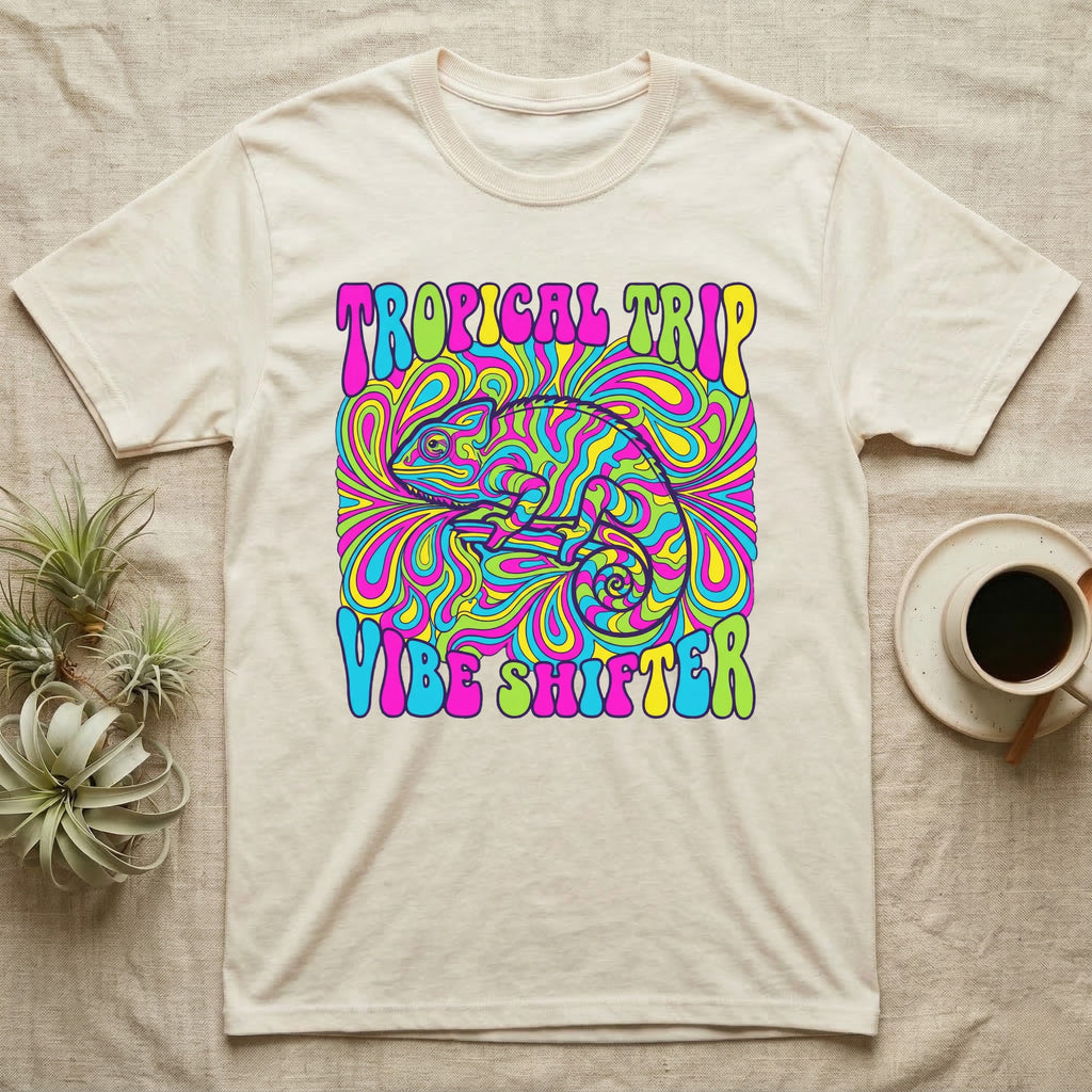 Cream t-shirt with psychedelic chameleon design and text "Tropical Trip Vibe Shifter".