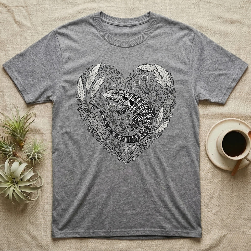 Grey t-shirt with a heart-shaped lizard and floral design.