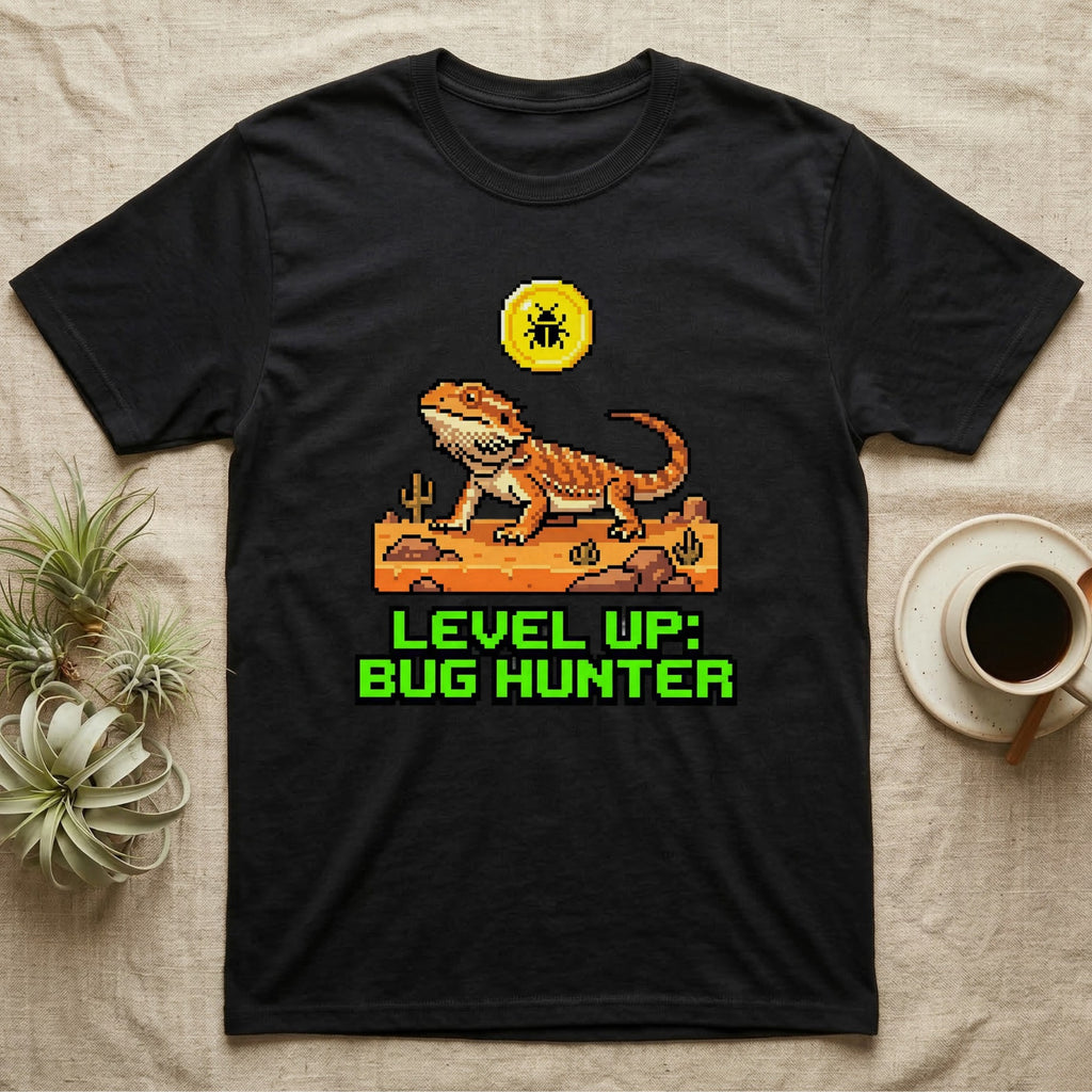 Black t-shirt with pixelated lizard and text "LEVEL UP: BUG HUNTER".