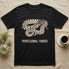 Hognose Professional Fainter T-Shirt in Black — Linocut block-print of a western hognose snake flopped belly-up in a death-feign with professional fainter caption.