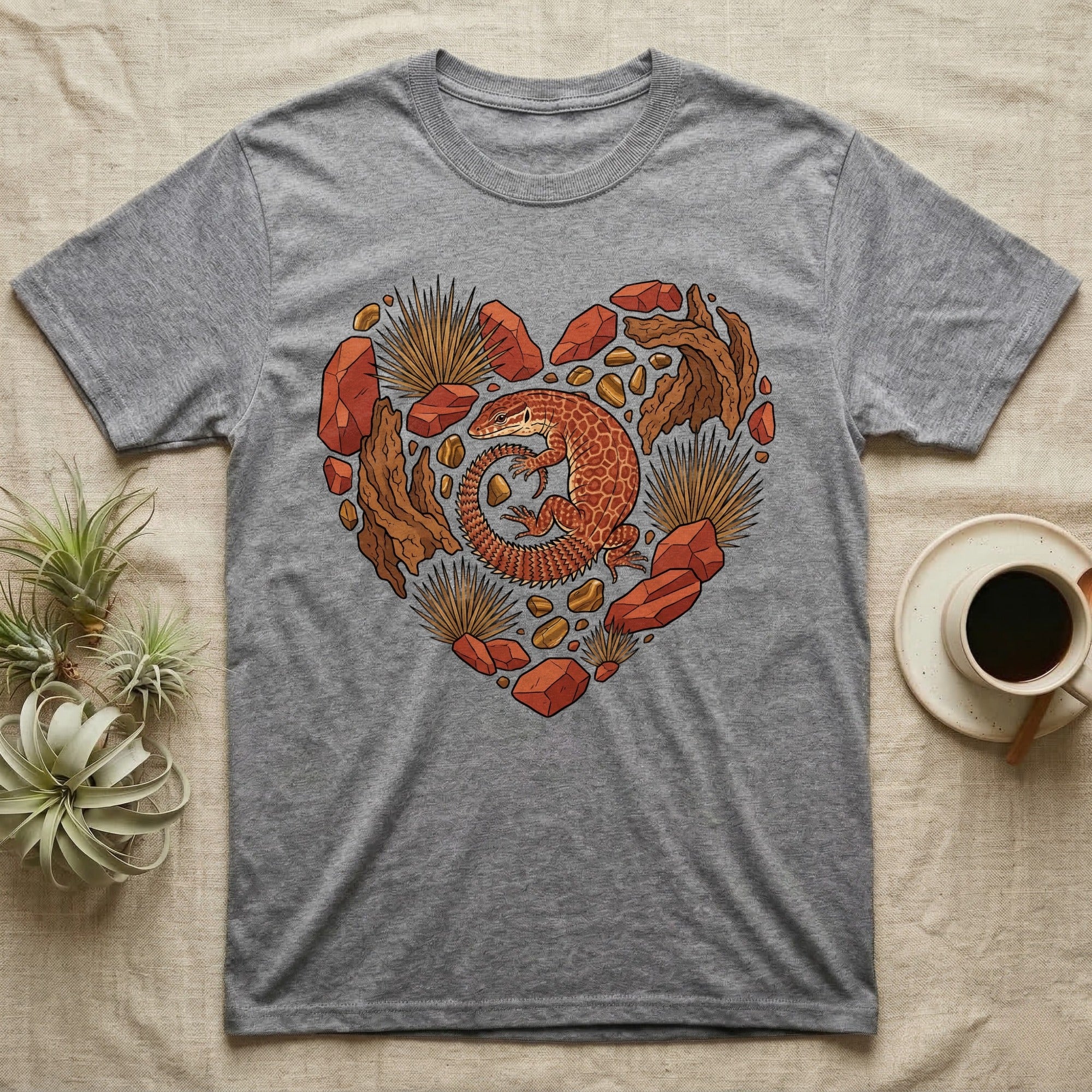 Gray t-shirt with a heart-shaped desert scene featuring a lizard.