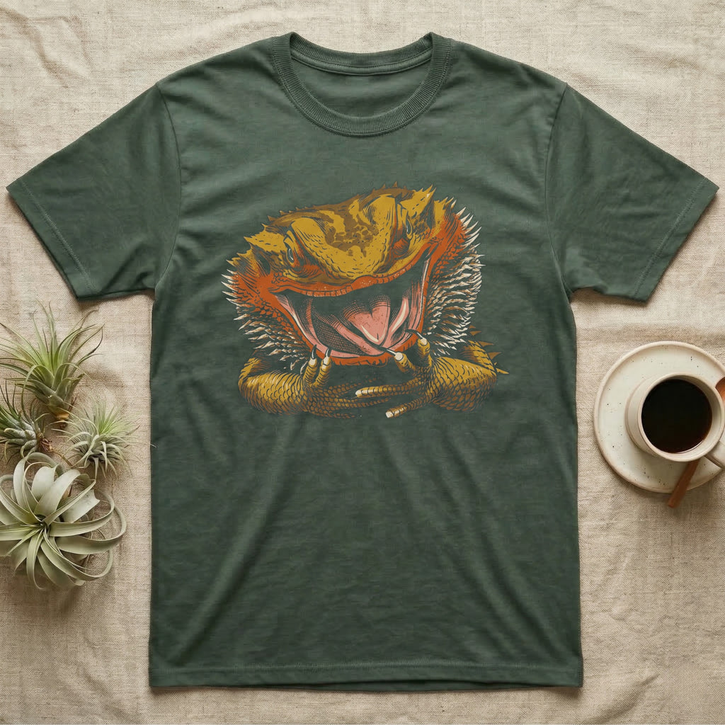Vintage ink illustration of a bearded dragon head with its mouth wide open, tongue out, front claws raised, no on-shirt text. — shown on a Military Green tee.