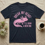 Axolotl Regrow T-Shirt in Navy — Worn one-ink pink axolotl walking side-on, gills spread, under Break My Heart, I'll Grow a New One