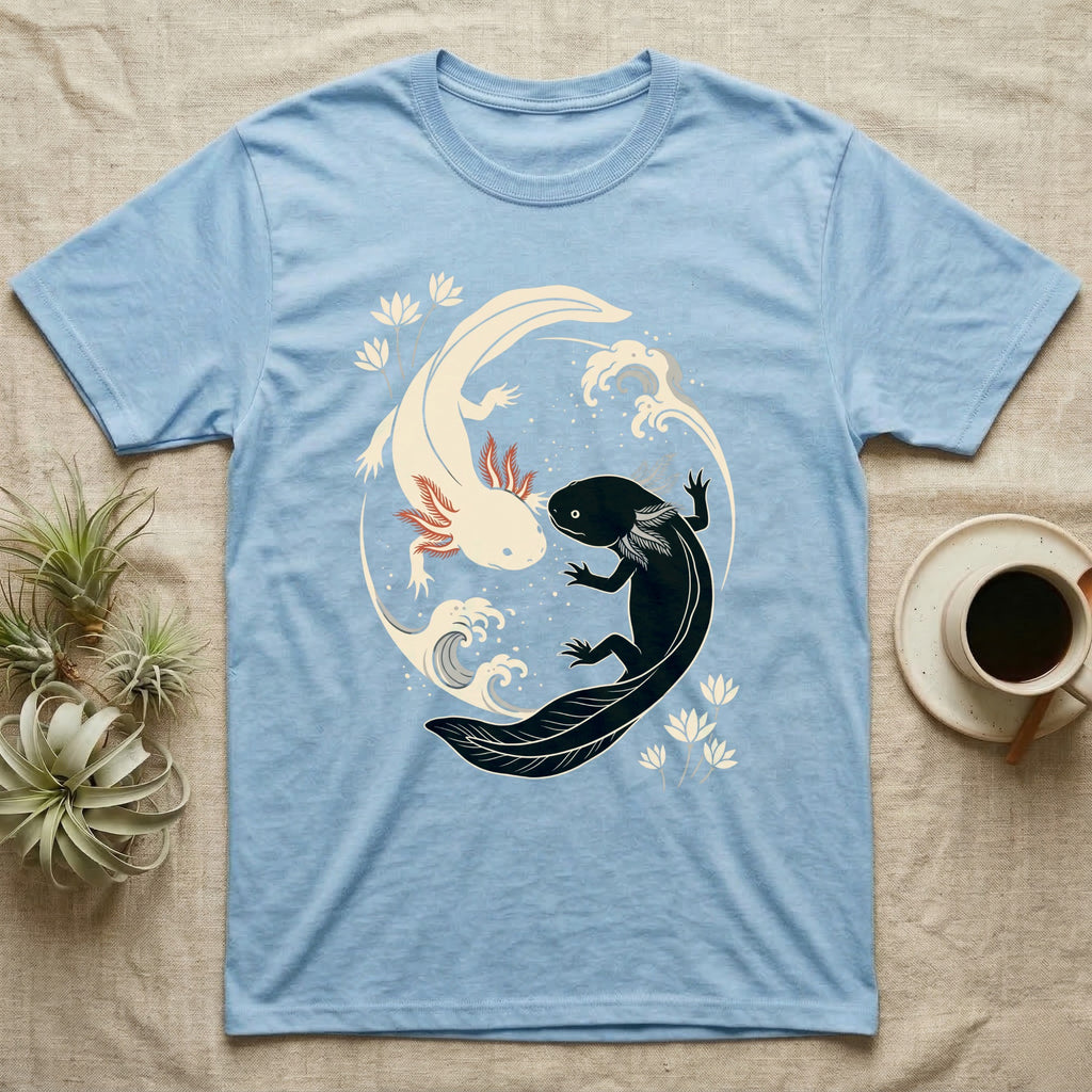 Axolotl Yin-Yang T-Shirt in Light Blue — Japanese woodblock style print of a cream axolotl with red gills and a black axolotl curled nose to nose into a circle with waves and water lilies