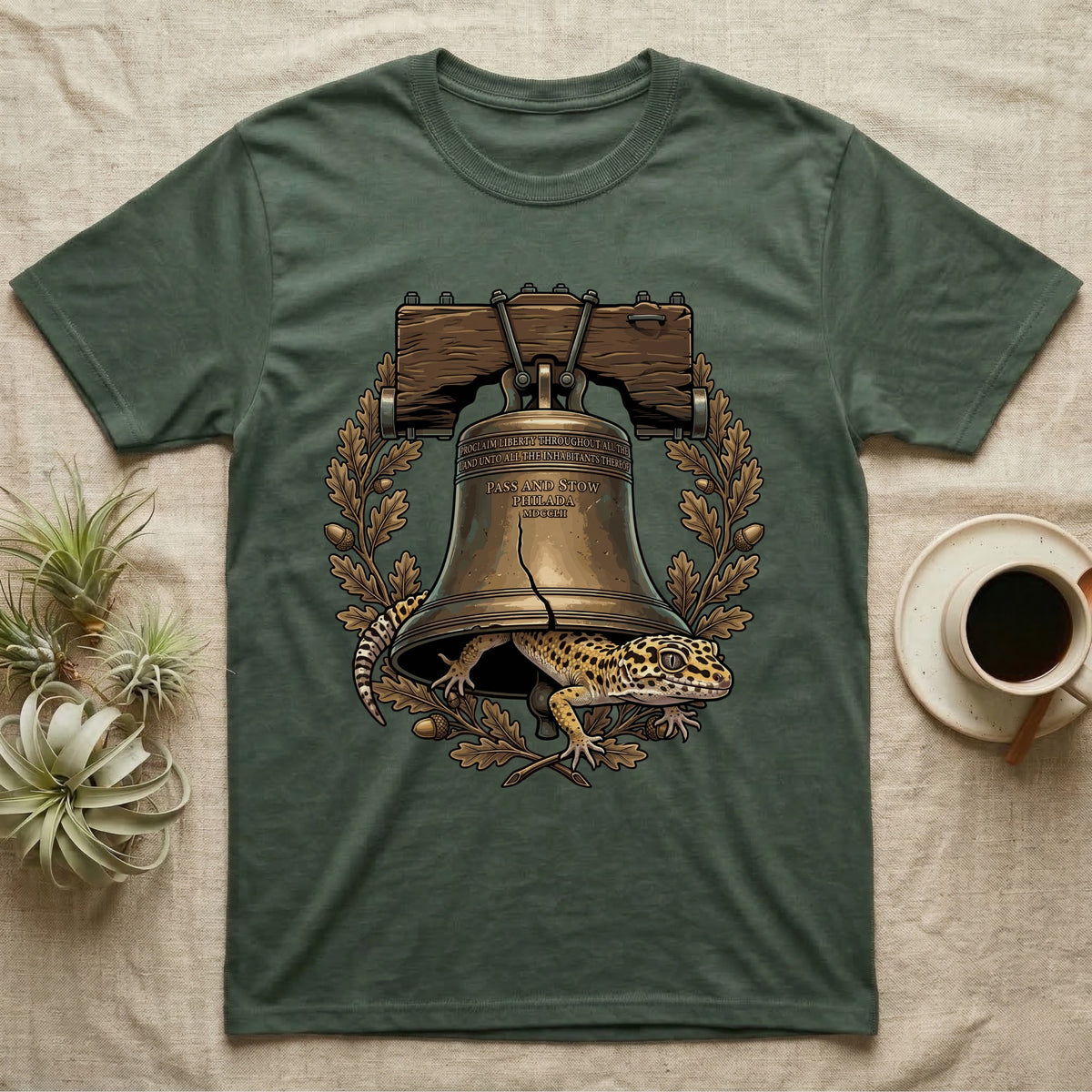 Leopard Gecko Liberty Bell T-Shirt in Military Green — Engraved leopard gecko emerging beneath the bronze Liberty Bell inside an oak-leaf and acorn wreath.